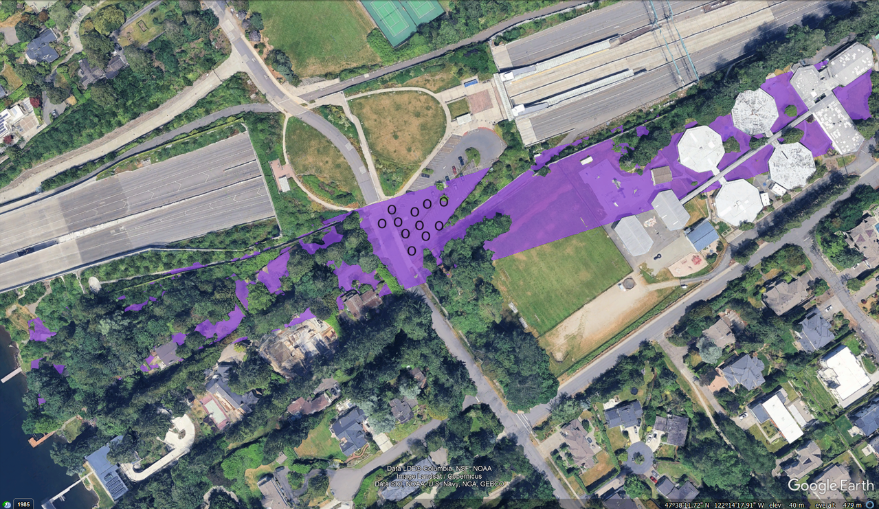 A google earth screenshot of a parking lot. Eleven o's mark the location of offensive players.