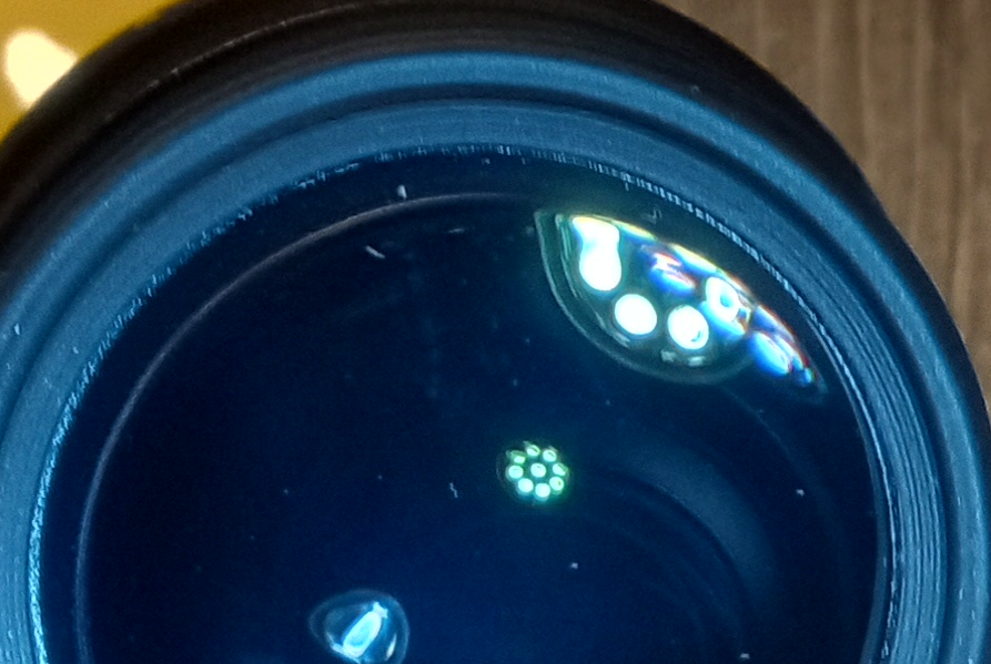 Lens Dust Example How to tell if it fugus or it factory dust in between the eyepiece lens ...