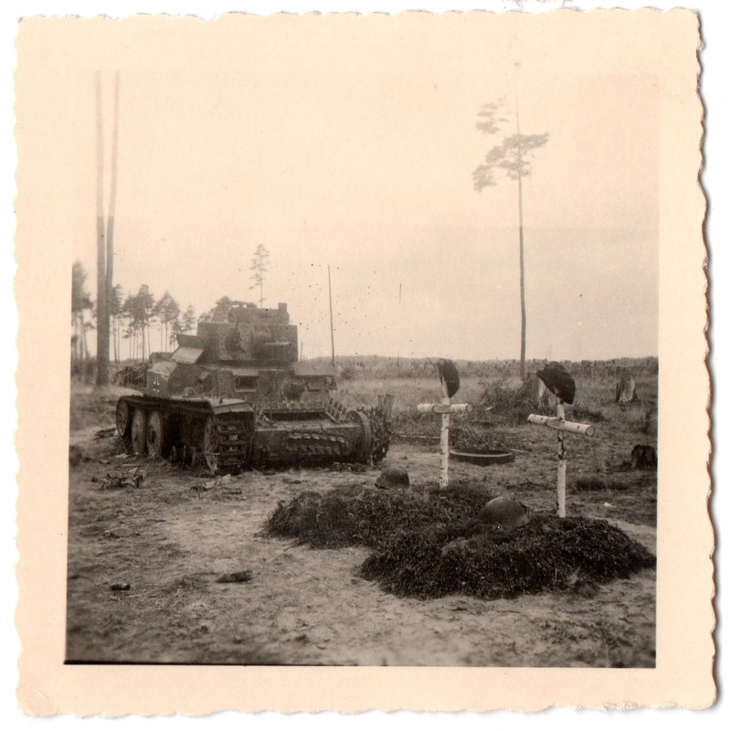 Panzertroops- Destroyed 38Tos Panzer beside Graves with Berrets