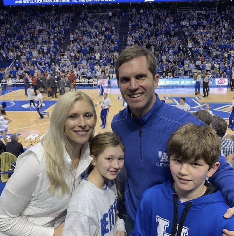 Andy Beshear to support a basketball team during the game at Rupp Arena with his family