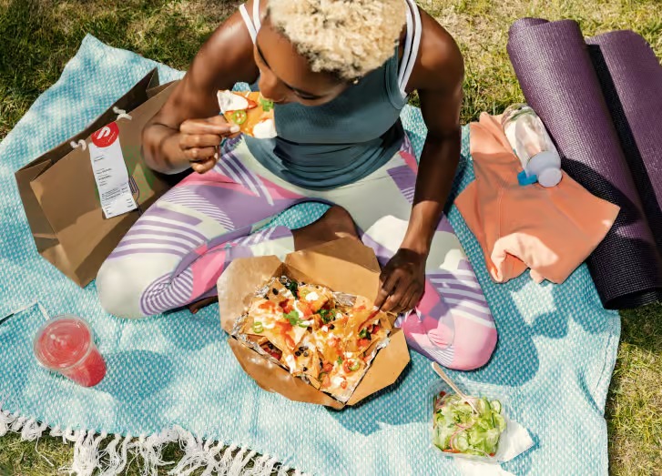 A-lady-eating-in-picnic