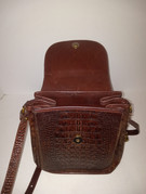 Adjustable leather strap and brass hardware