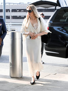 Angelina-Jolie-Nip-JFKAirport99