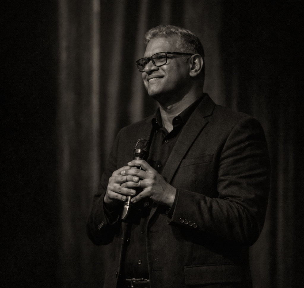 Sanjeev speaking to audience