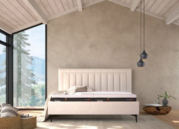 Ein stilvolles Tempur Design Bett in einem modernen Schlafzimmer.