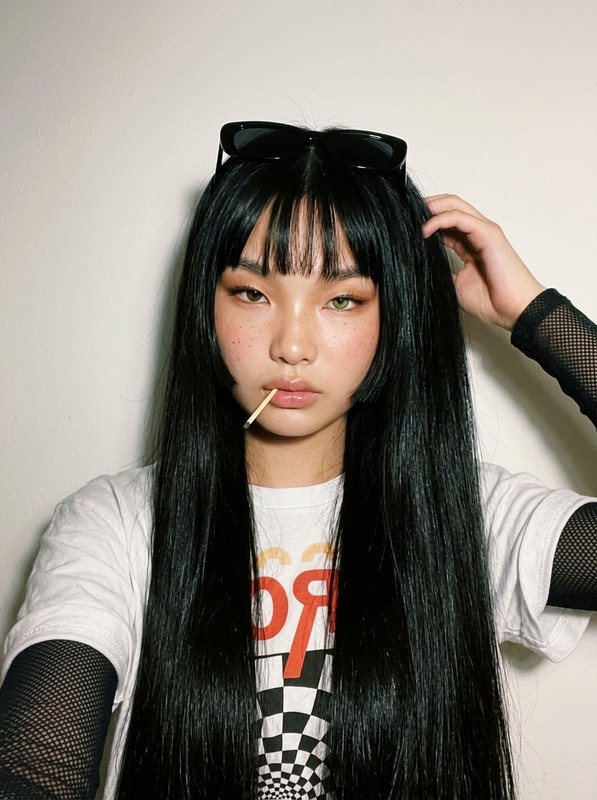 Young Asian woman 202603231838