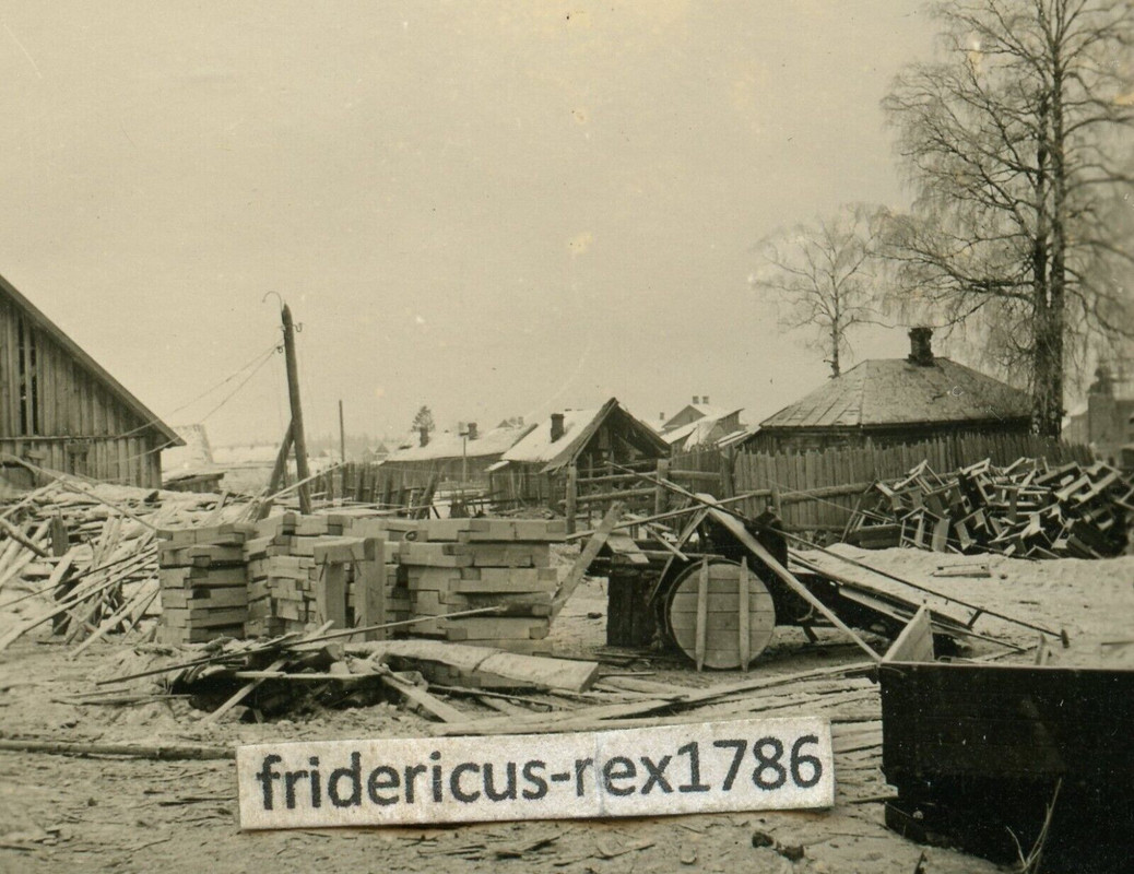 Fotos WH HKL Ostfront Winter Geschütz Kanone mit Holz abgetarnt Stellung3