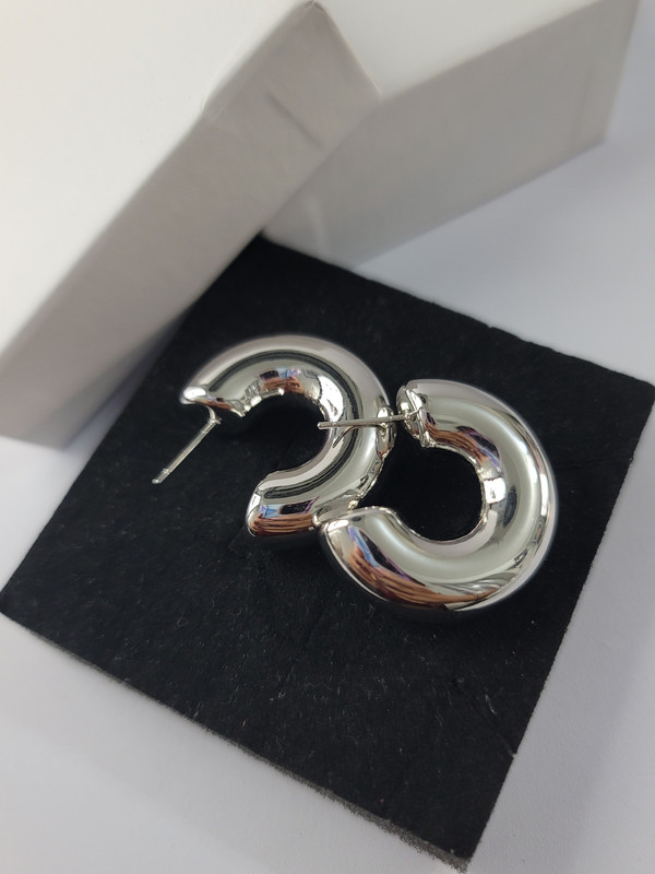 Arete plateado 11