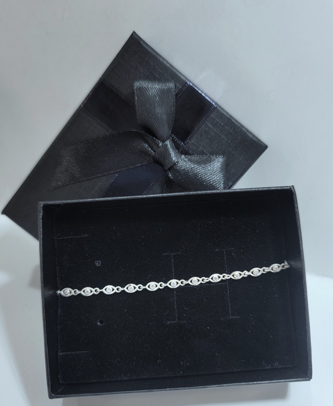 Manilla de ojitos #010010