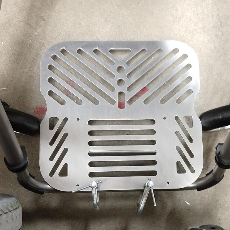 Custom aluminum footplate on Ti lite wheelchair