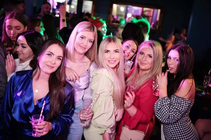 Girls dancing and smiling