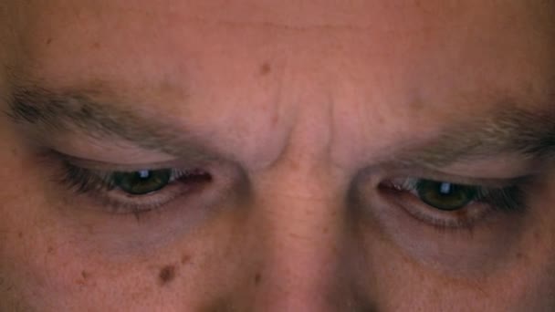 depositphotos-128099586-stock-video-eyes-of-serious-frowning-cau
