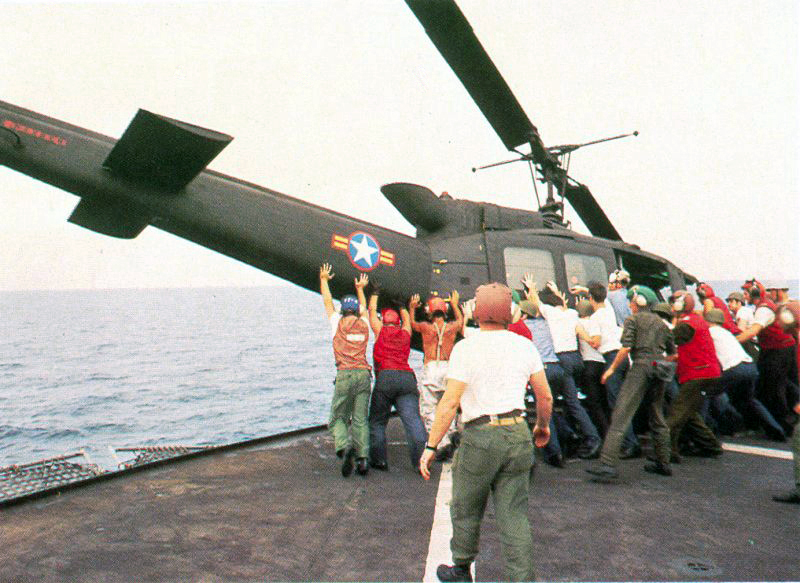 vietnamese-uh-1-pushed-over-board-operation-frequent-wind.jpg