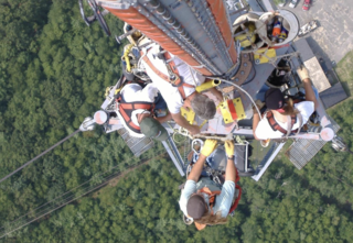 TSG Crew on a transmission tower