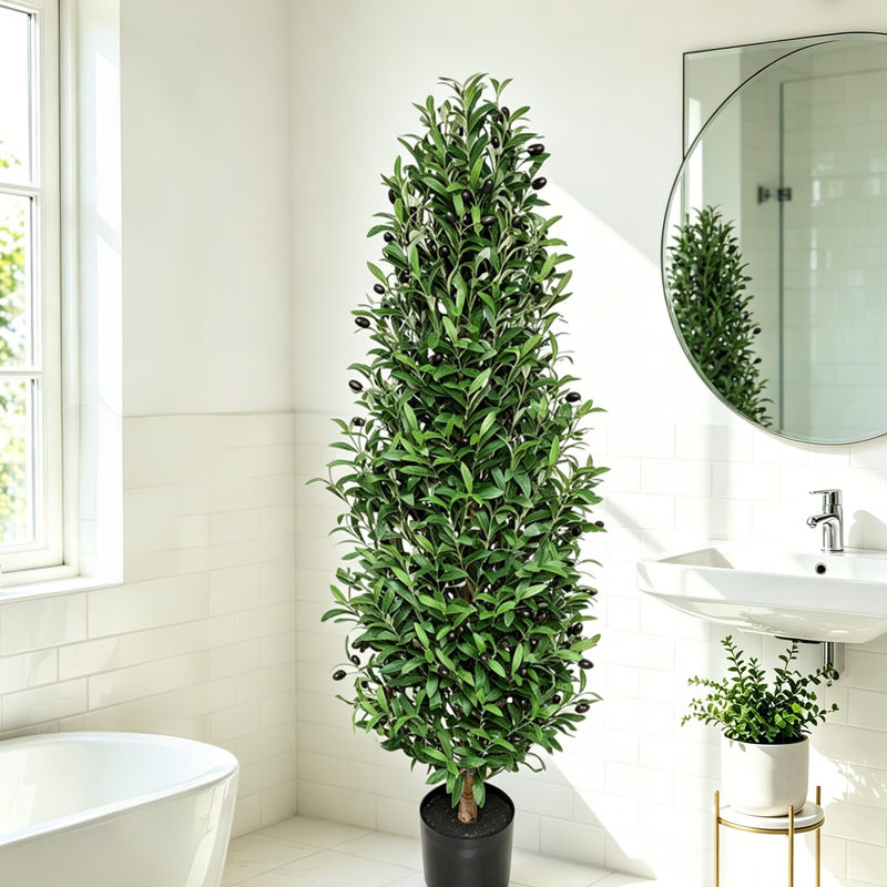 Faux olive tree in bright bathroom corner