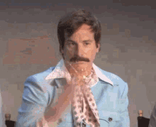 https://i.postimg.cc/brPQspFf/confetti-moustache.gif