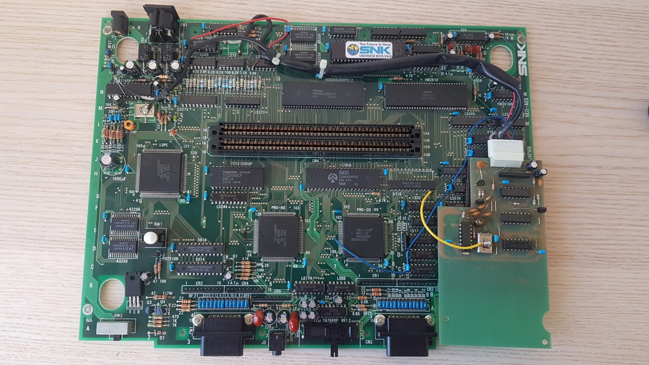 Neo Geo AES (NECT-16T) avec une pcb fille verte?! E3c51132-cdfe-4ff8-b937-fdc44c2bd637