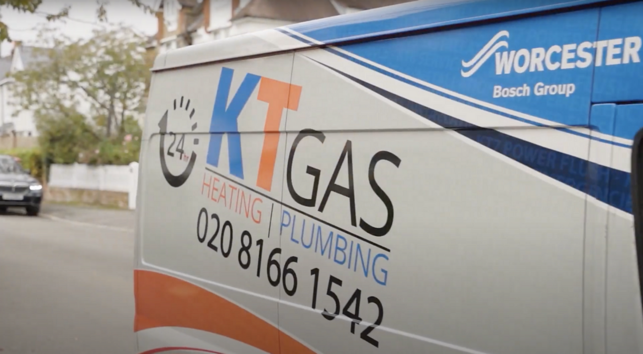 KT Gas heating and plumbing van parked on a local street
