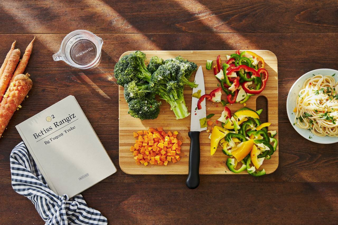 Healthy home cooking with fresh vegetables to save money on a tight budget