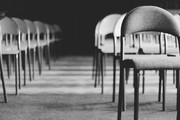 grayscale-photo-of-empty-folding-chairs-1233340
