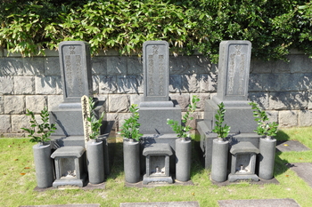 three headstones next to each other