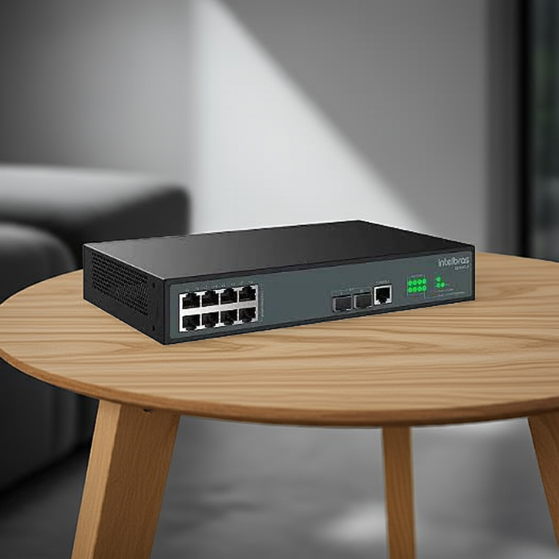 Visão frontal do Switch Intelbras S2310G-A com destaque para seu design compacto e elegante.