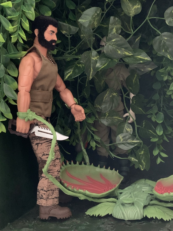 Action Man is doomed by getting grabbed by the Venus human trap vines. 7866-A656-E49-E-4-A9-A-974-F-088-BF6-D2-BA1-A
