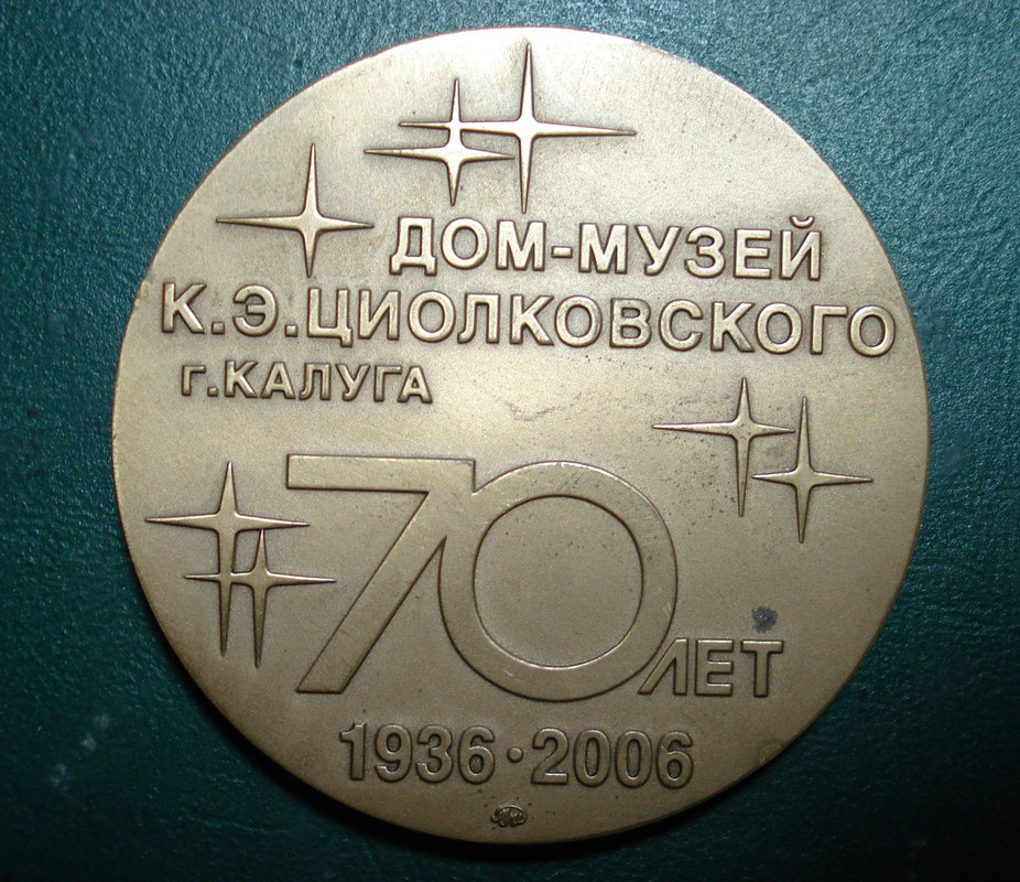 ц77
