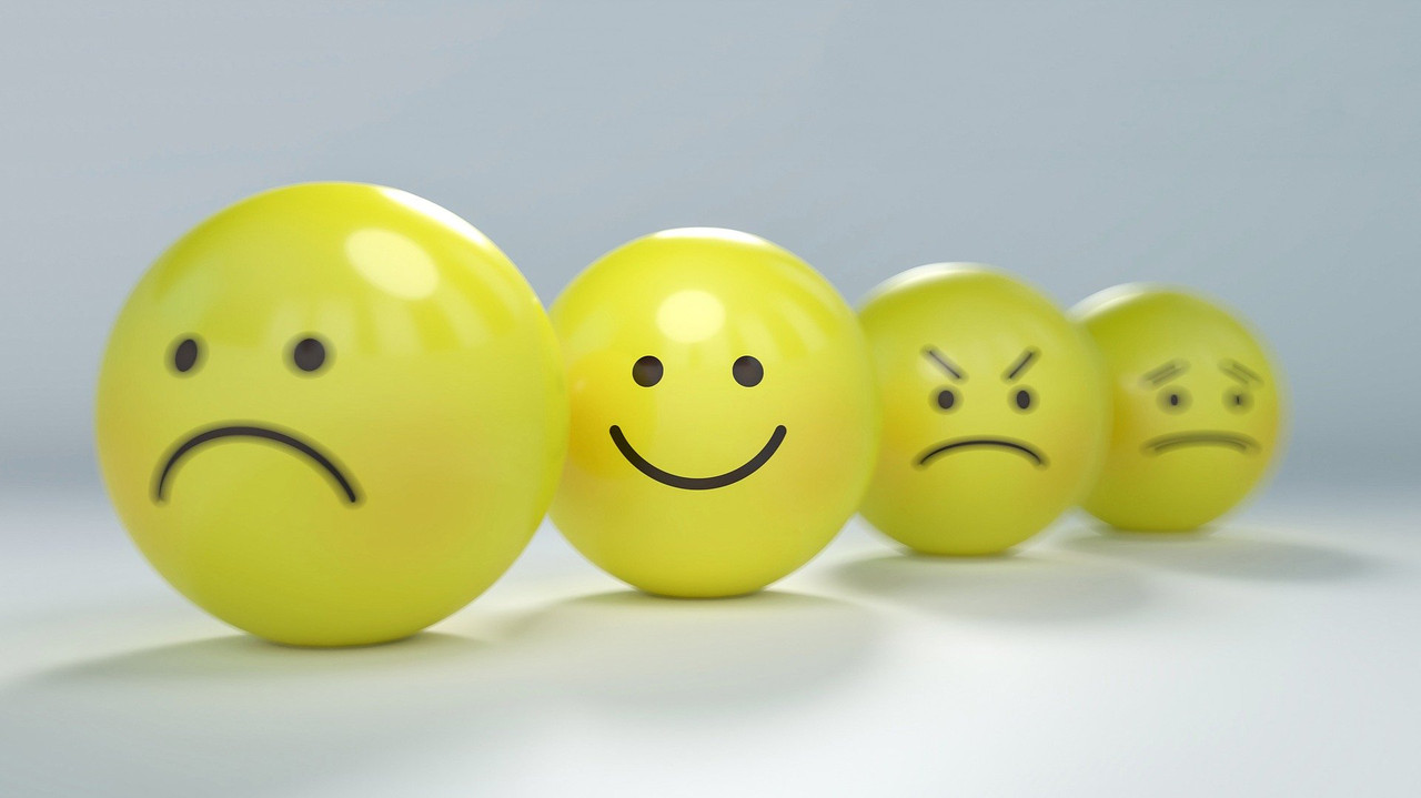 Smiley faces showing different emotions.