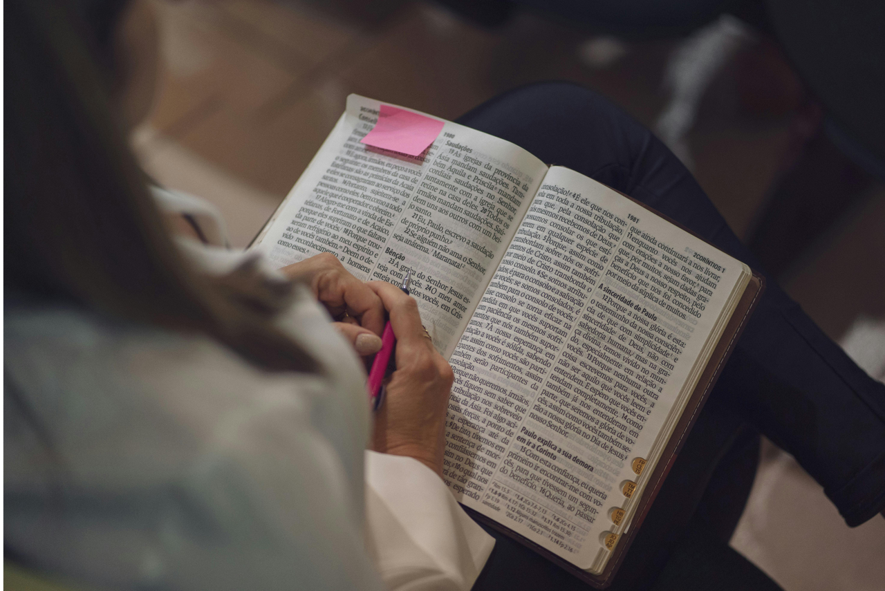 A group of adults in a Bible study session.