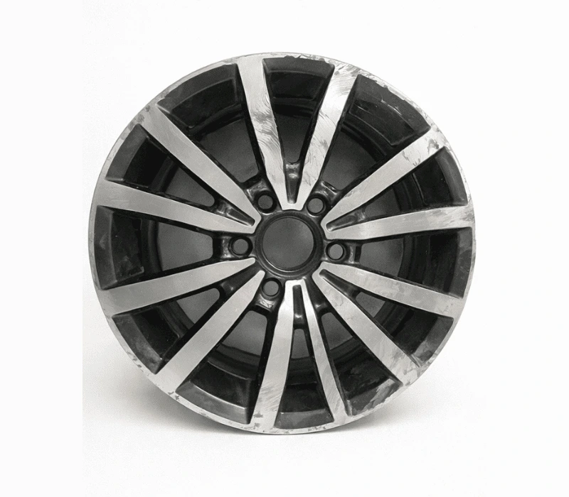 Avant réparation d'une jante frottée