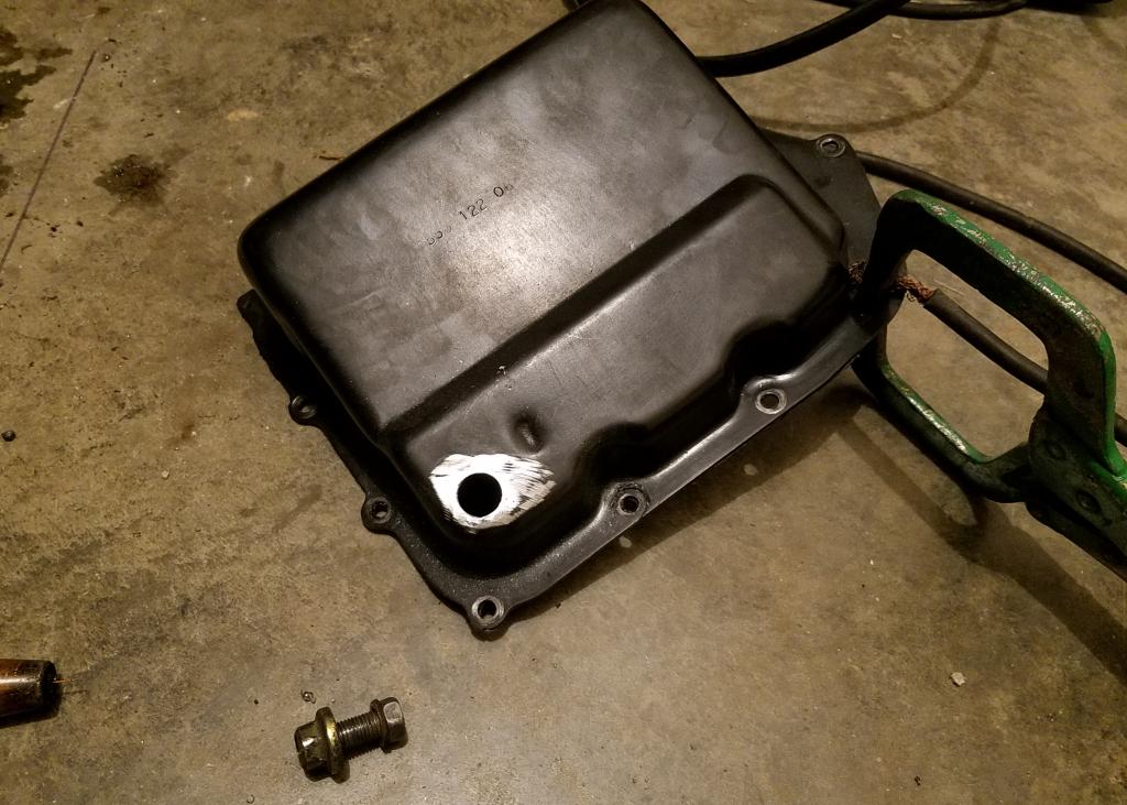 Welding ATF drain plug bung onto pan BobIsTheOilGuy