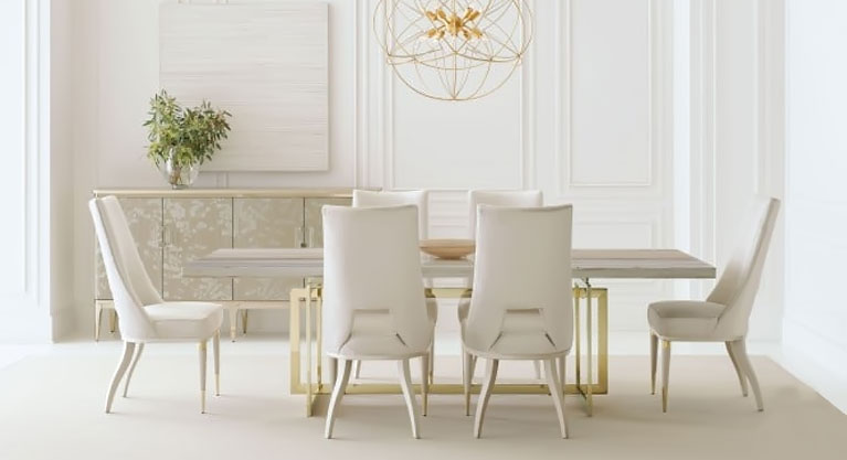 Because not all dining rooms are created equal, there’s the Wish You Were Here table. An extraordinary example of organic luxe, it offers an ultra-impressive 100-inch tabletop of gray sandstone. Earthy tones meld with greiges and soft grays to create a visual that’s sleek and modern while still feeling warm and natural. A bold, open geometric base finished in Whisper of Gold creates a mix of materials and brings in the glamour. With a dining room table this stunning, you’ll hesitate to cover it!