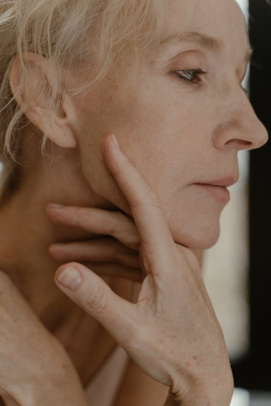 a woman with increased fine lines and wrinkles due to compromised skin barrier 