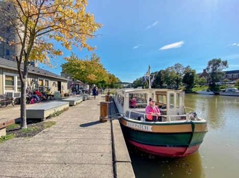 Pittsford canalfront with boat