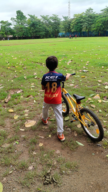 Adult student learning gearless scooty control safely
