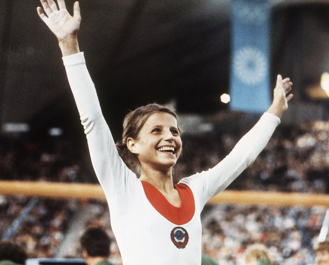 https://i.postimg.cc/c4TQJ1R2/Olga-Korbut-1972-Summer-Olympics-Germany-Munich-1972.jpg