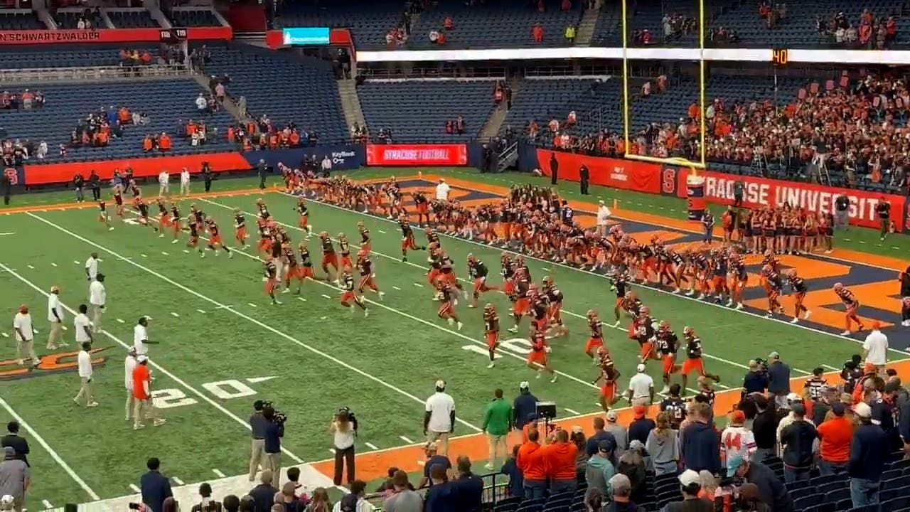 2717589 syracuse coach fran brown team run