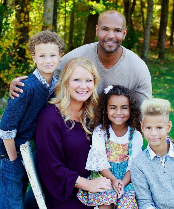 Jerome Adams with his wife and children