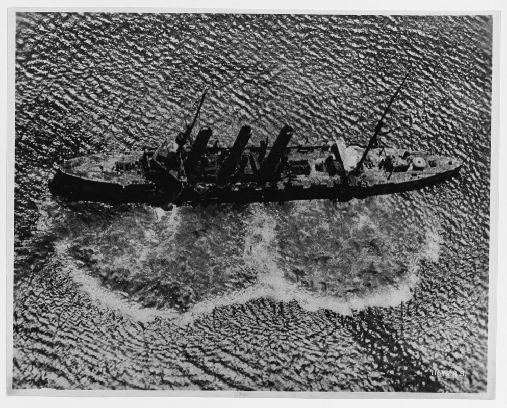 Tsugaru со следами близких разрывов (Pallada) NHHC