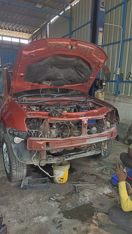Oil cooler and 4 wheel suspension work replacement