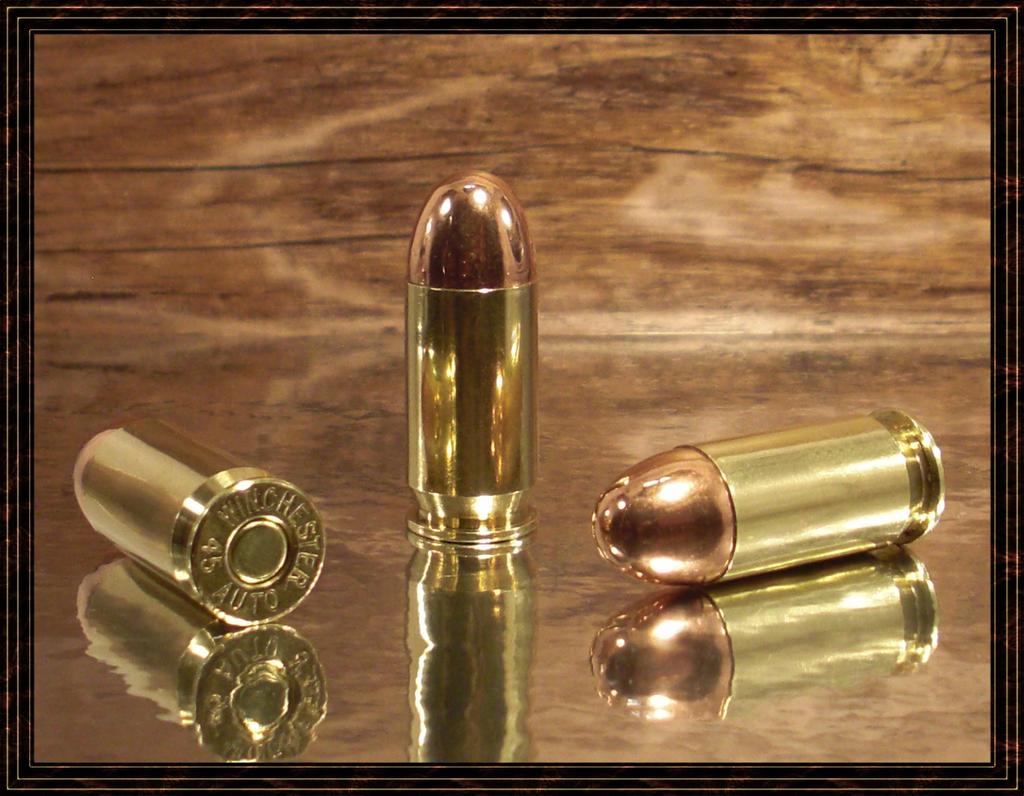 https://i.postimg.cc/cCzZMF27/45-ACP-WIN3x-RN.jpg