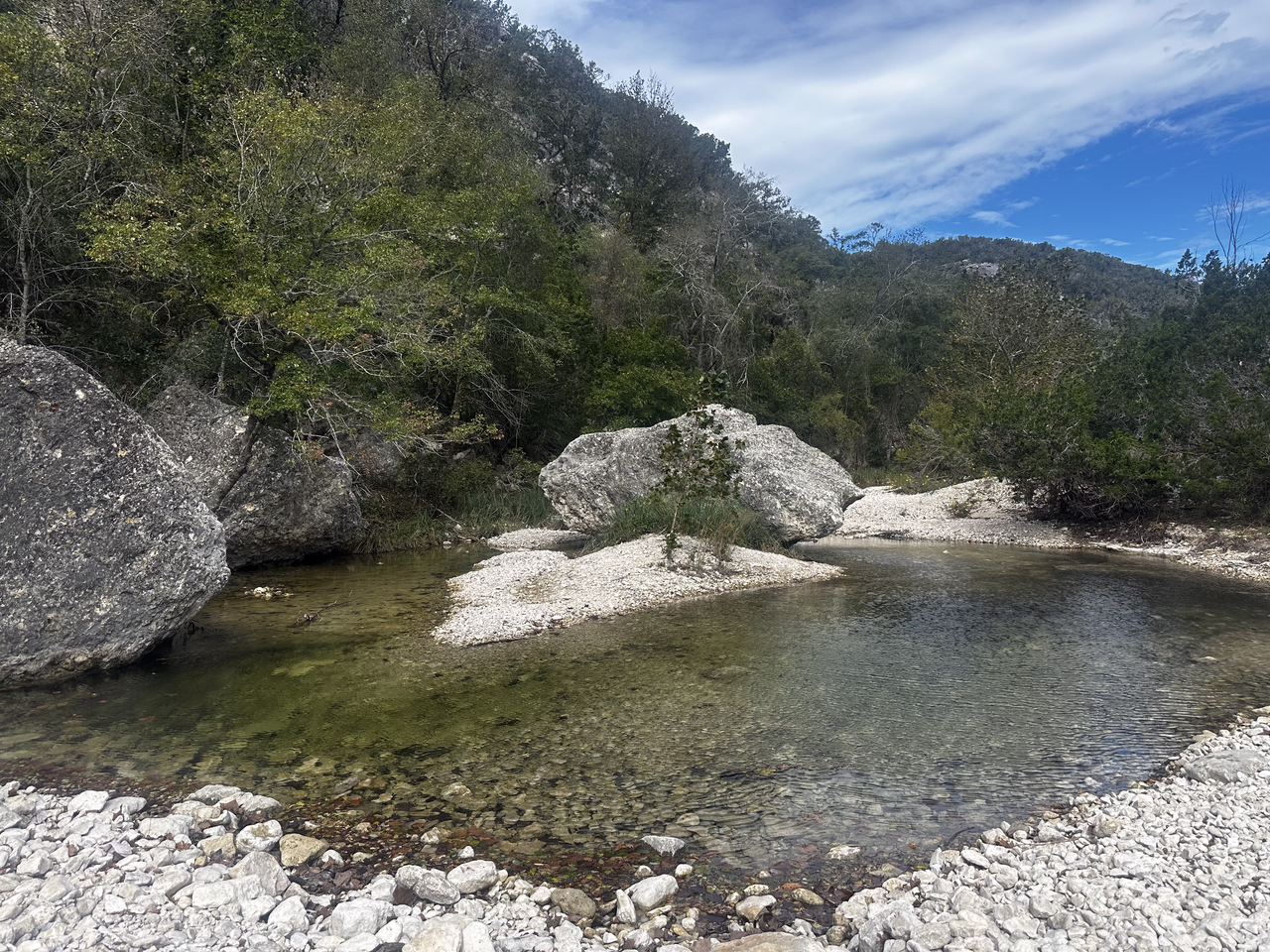 a small, rocky pond