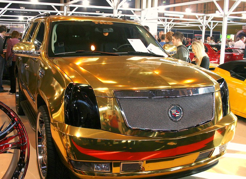 goldcadalacescalade.jpg