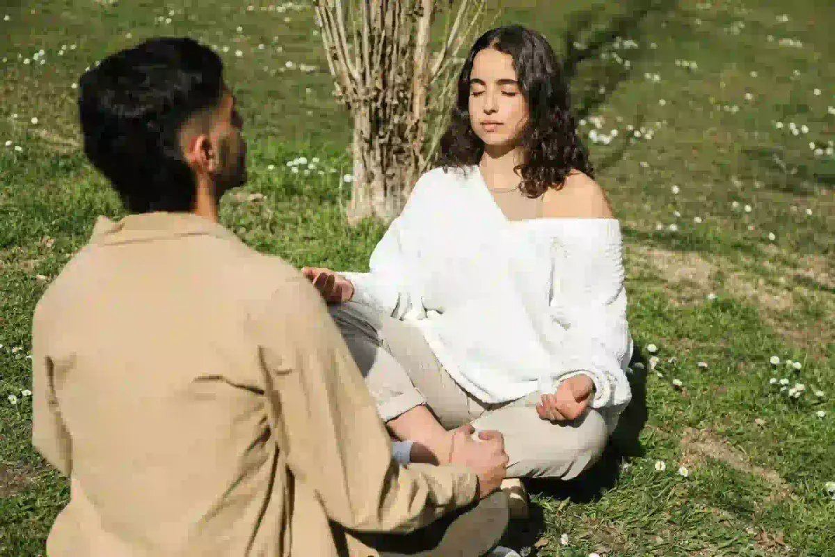 Couple Meditating Facing Each Other - Anxiety & Stress Relief