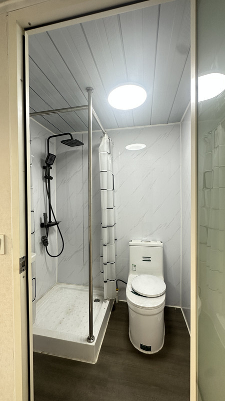 Interior showing loft and vertical storage