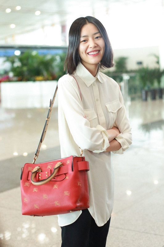 liu-wen-at-airport-in-beijing-08-14-2018-7