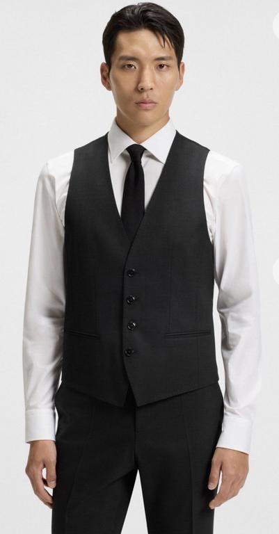 Micro-patterned slim-fit suit side view – stylish black men's tailored suit