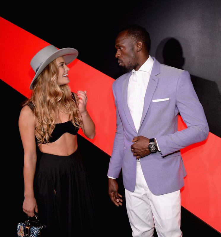 nina-agdal-at-g.h.-mumm-and-usain-bolt-s-toast-t