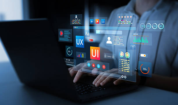 Designer building a responsive app and website across desktop, tablet and phone